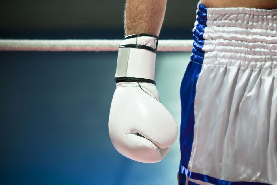 4337158 - cropped view of man with boxing gloves. copy space